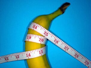 Measure penis during enlargement using banana as an example